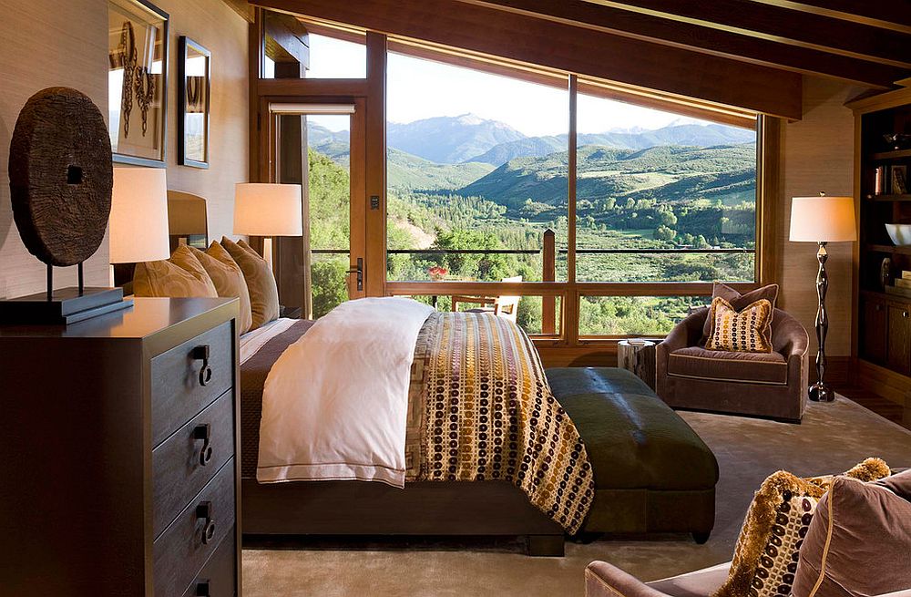 Bedroom of the vacation home with sloped ceiling and unabated mountain views