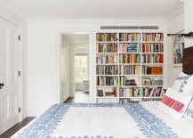 Bookshelf-adds-color-and-contrast-to-the-all-white-bedroom-217x155