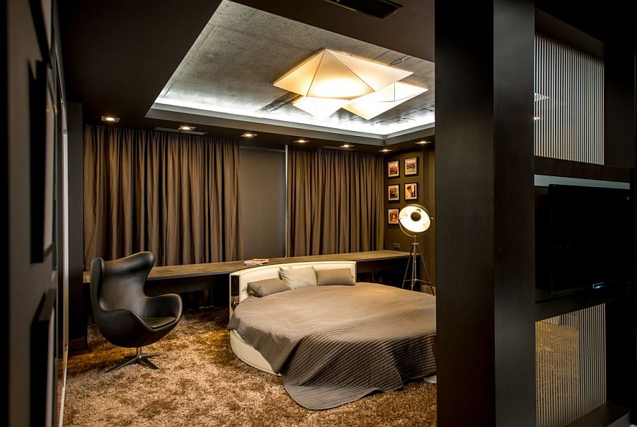 Circular bed and tripod lighting for the contemporary bedroom