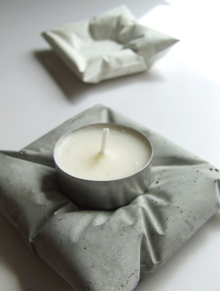 Concrete pillow candle holders