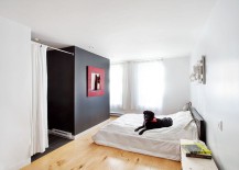 Contemporary-bedroom-in-white-with-a-black-accent-feature-217x155