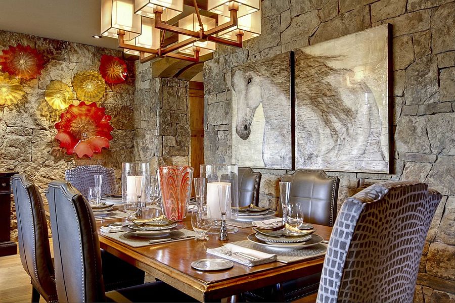 Contemporary dining room with rustic stone walls