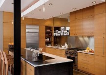 Contemporary-kitchen-draped-in-wood-217x155