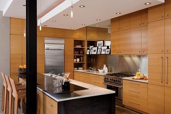 Contemporary kitchen draped in wood