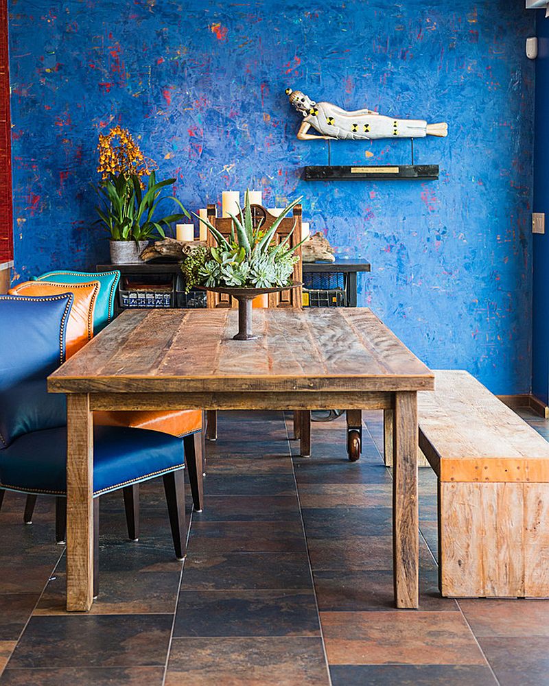 Cool blue textured wall is the showstopper in this relaxing, casual dining room