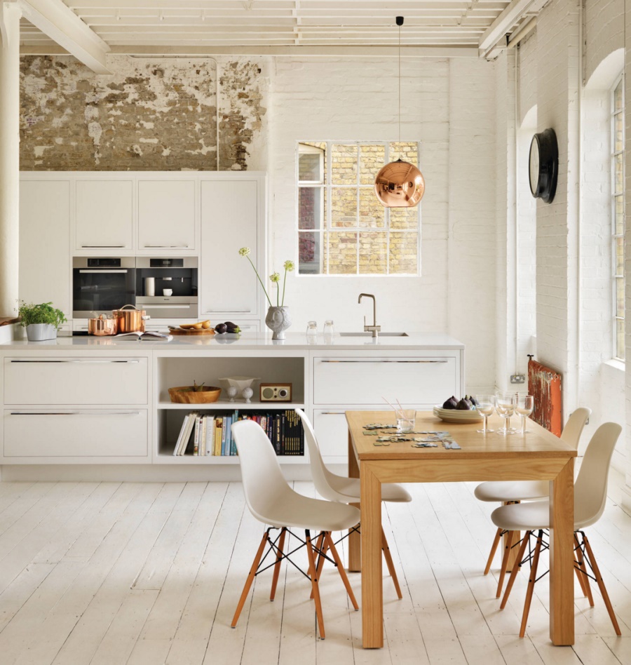 Copper and stainless steel in an airy modern kitchen