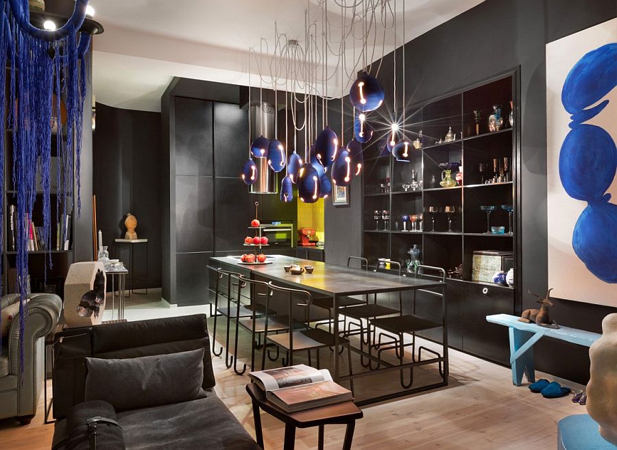 Dark and colorful dining room ends up becoming the showstopper of the apartment