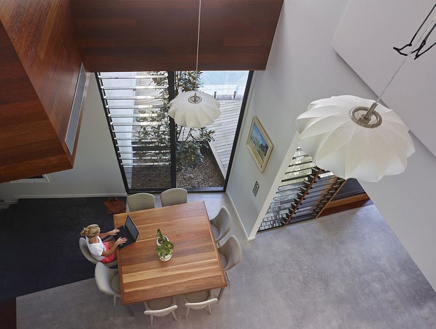 Double height spaces give the interior a spacious appeal