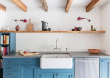 Elegant-use-of-sleek-floating-wooden-shelf-in-the-kitchen-217x155