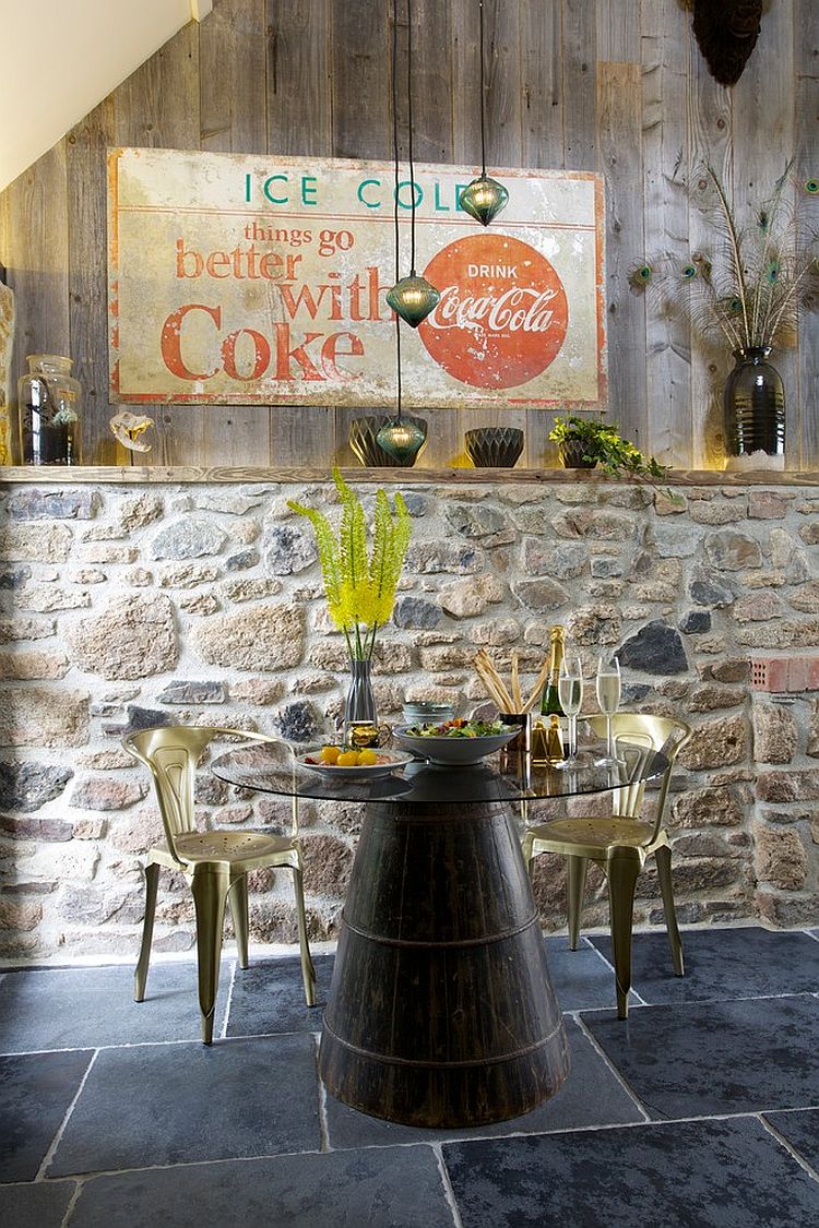 Fabulous eclectic dining room with distressed wood and stone wall [Design: Woodford Architecture and Interiors]