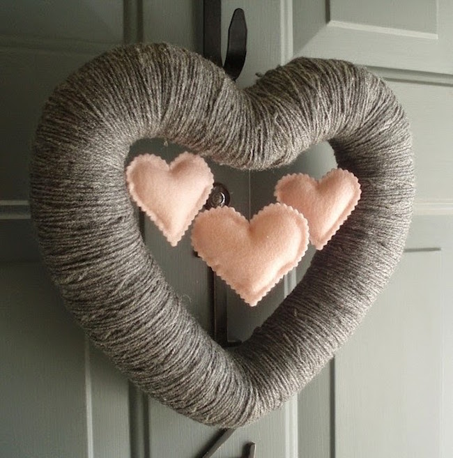 Heart-shaped Valentine's Day wreath made from yarn with mini hearts