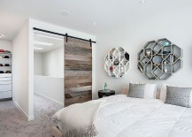 Hexagonal-shelves-above-the-bed-provide-visual-and-textural-contrast-217x155