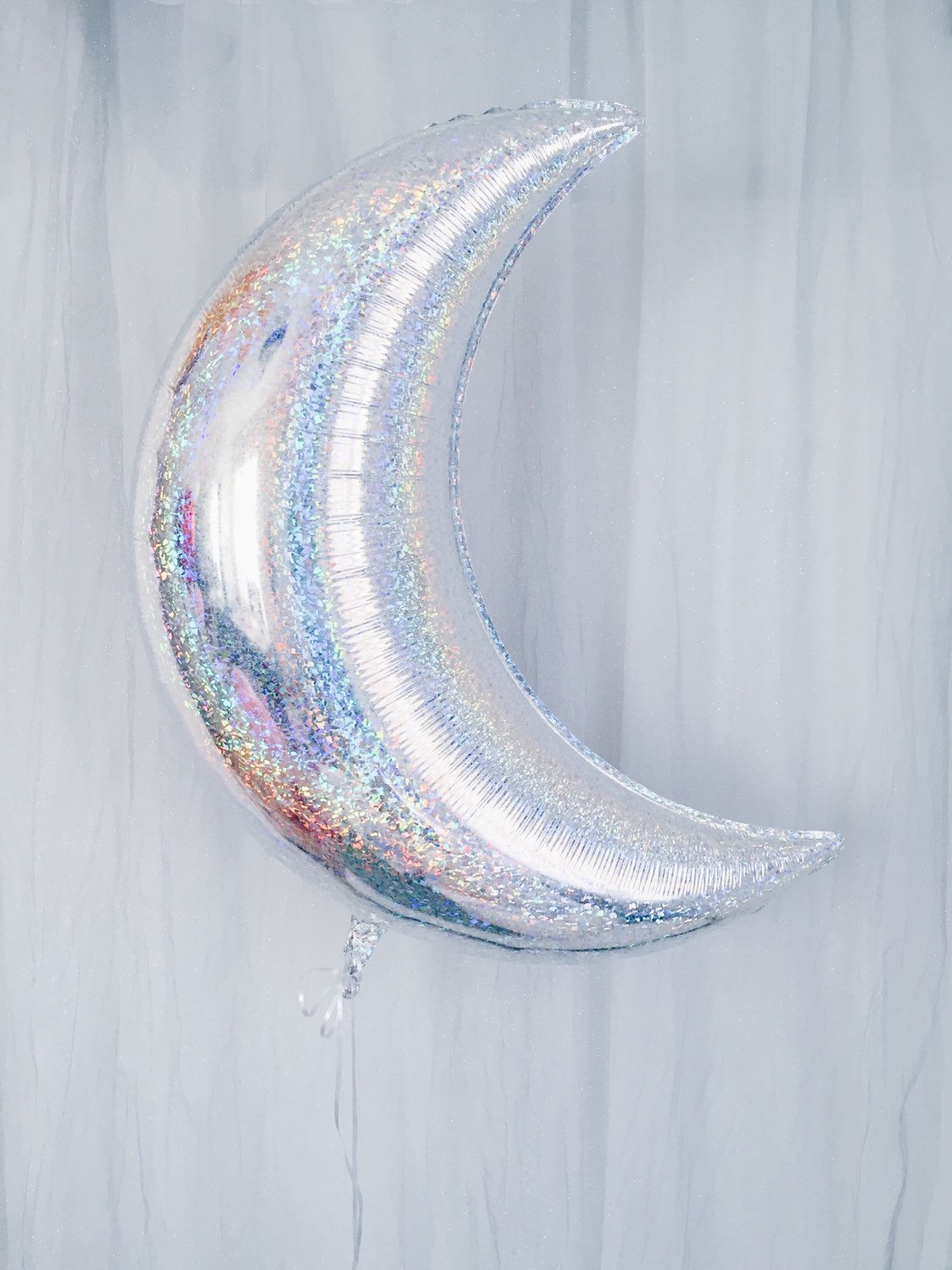 Holographic mylar balloon from Etsy shop Oh Shiny Paper Co.