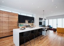 Kitchen-dining-area-and-TV-room-combine-to-create-the-family-zone-on-the-top-level-217x155