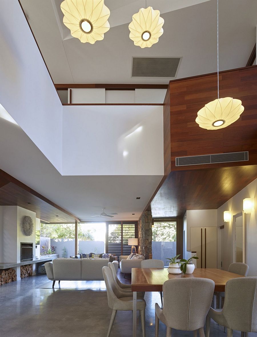 Lighting above the dining table accentuates the vertical space on offer