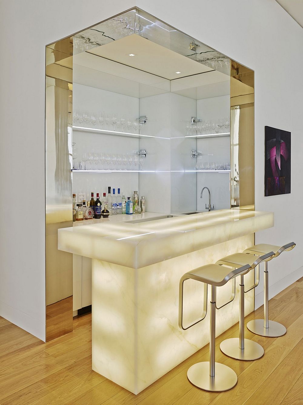 Lighting steals the show at this beautiful home bar