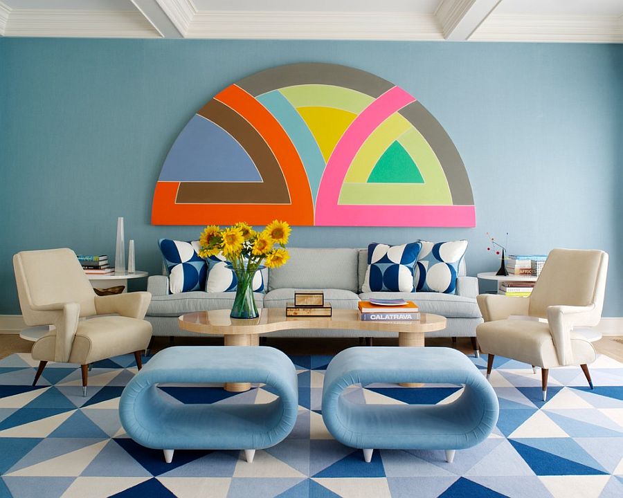 Living room draped in blues with a hint of pink and orange