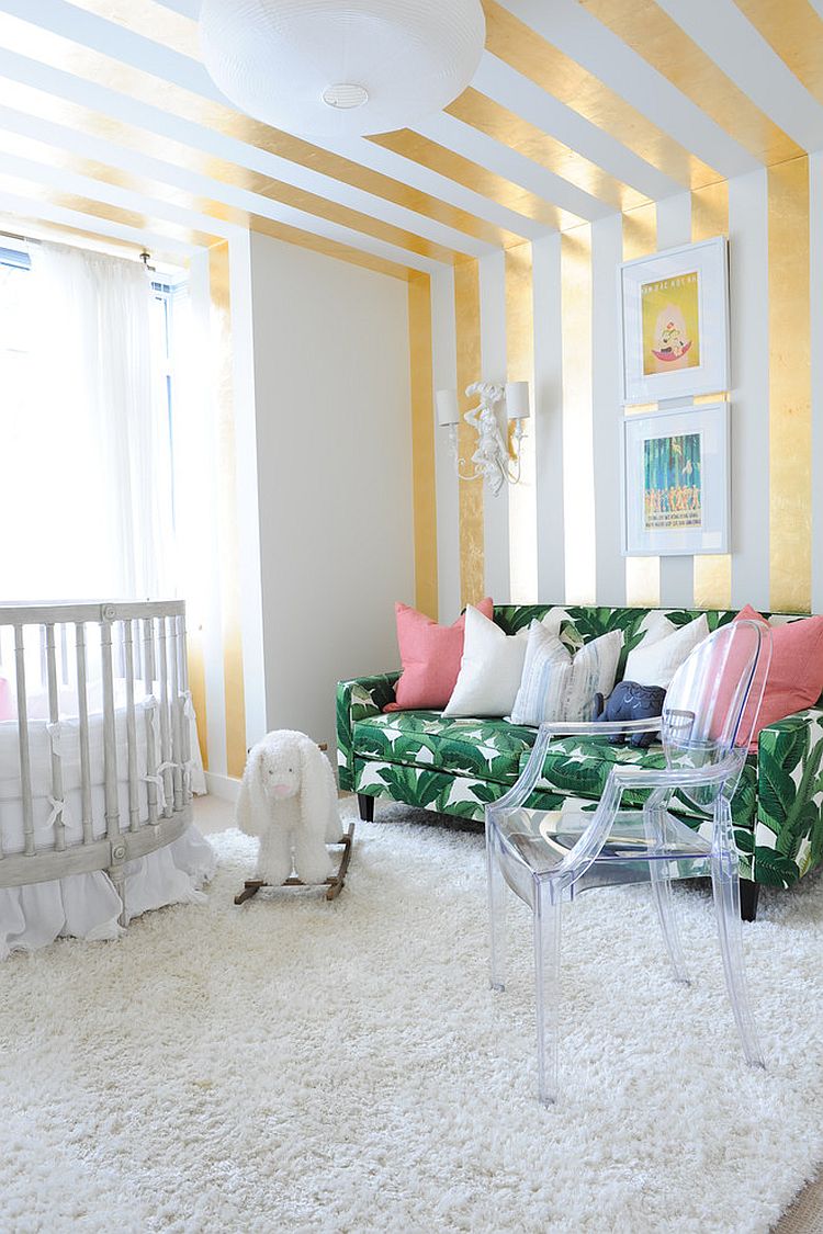 Lovely gold stripes make a big impact in the white nursery