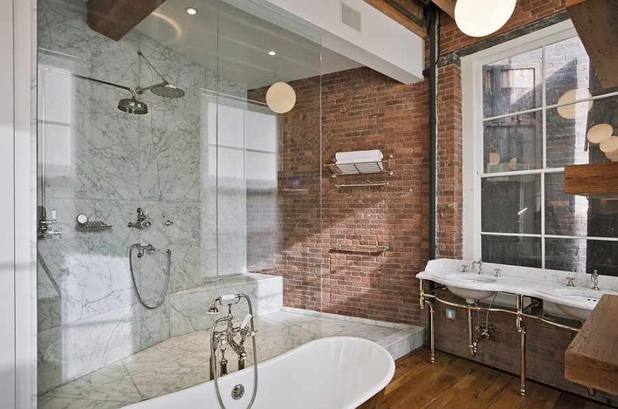 Marble and brick come together inside this industrial bathroom [From: Jane Kim Design / Photography by Eduard Hueber]