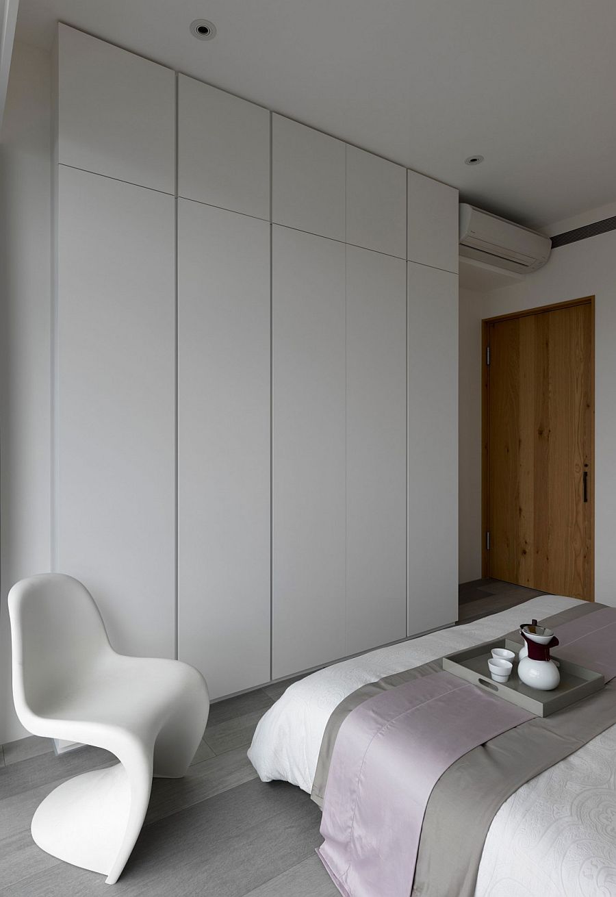 Minimal white wardrobe for the small contemporary bedroom