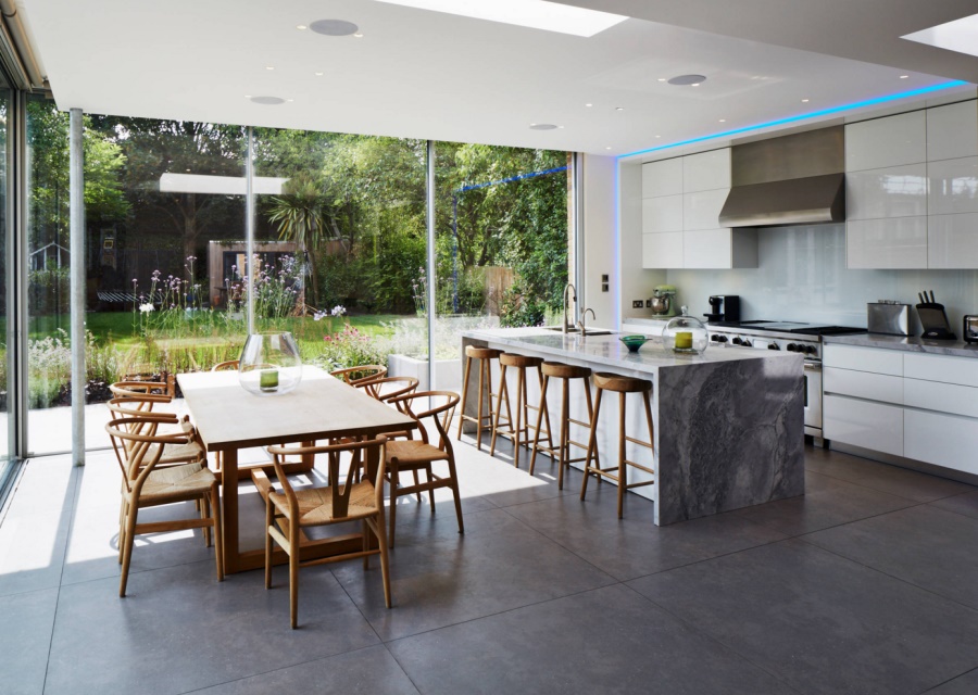 Mixed materials kitchen with stone, metal and wood