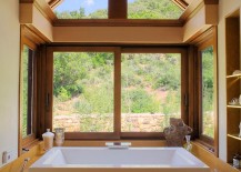 Modern-bathroom-with-jacuzzi-and-an-airy-ambiance-217x155