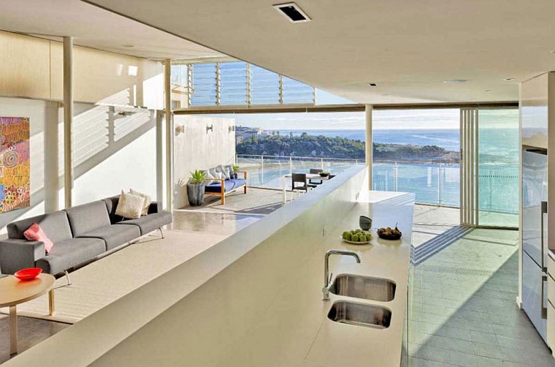 Modern kitchen and living room of beachside private residence in Sydney