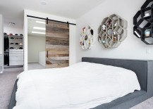 Modern-minimal-master-bedroom-with-sliding-barn-door-217x155