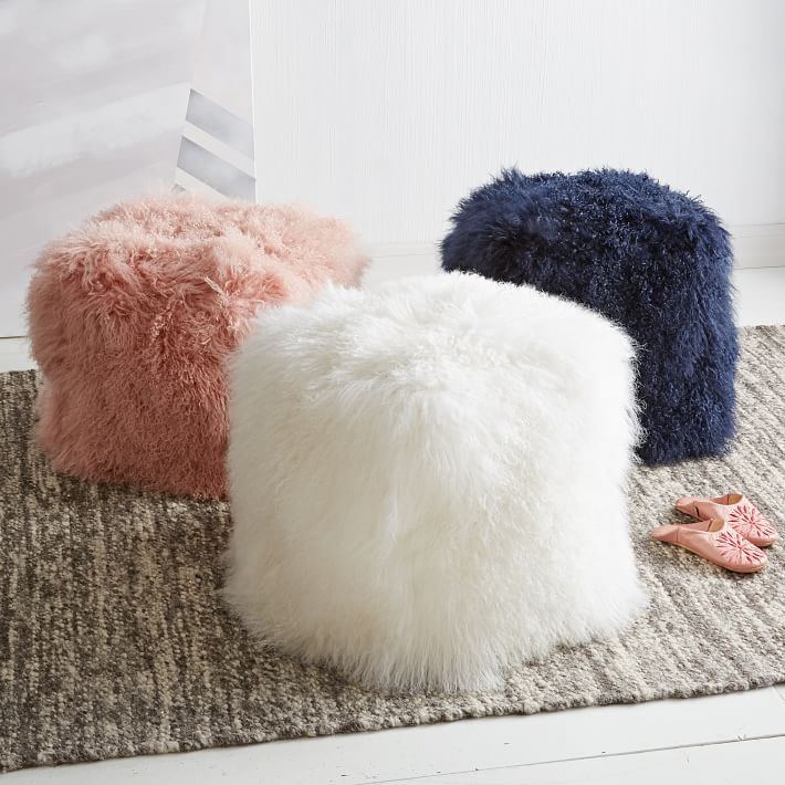 Mongolian lamb poufs from West Elm