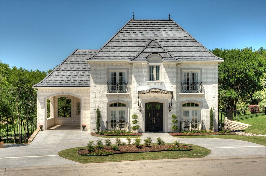 Multiple Juliet balconies become a wonderful part of the home's exterior [Design: John Askew Company]