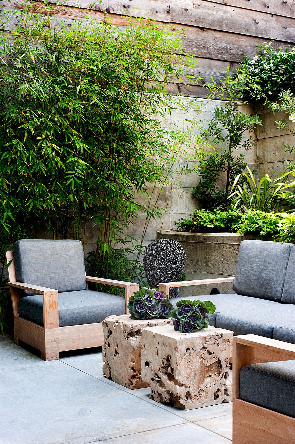 Outdoor living uses Chinese scholar stones as coffee table