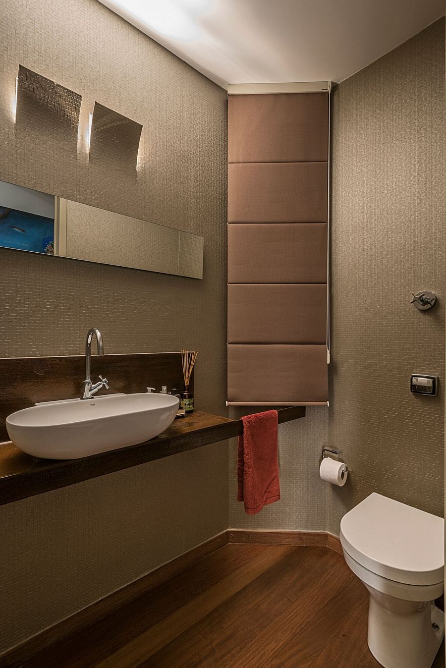 Powder room on the first level is kept simple and modern with minimal color