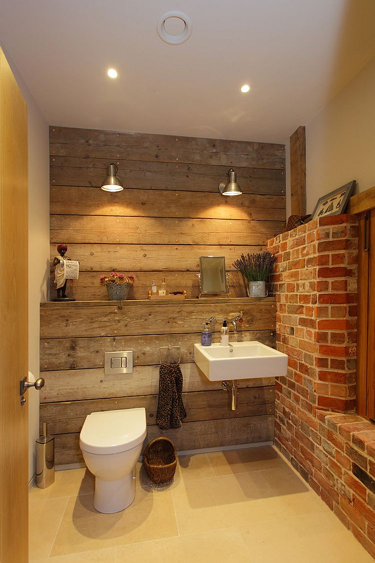 Rustic bathroom with reclaimed wood and exposed brick walls [Design: Hampshire Light]