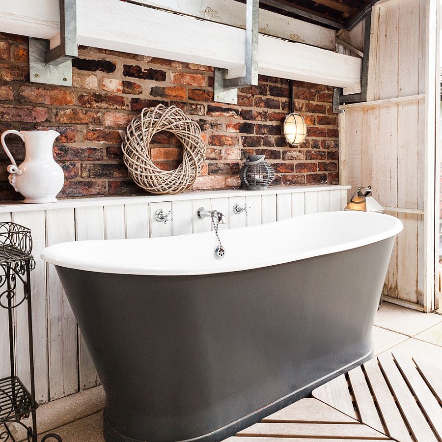 Soothing rustic bathroom with bathtub in gray