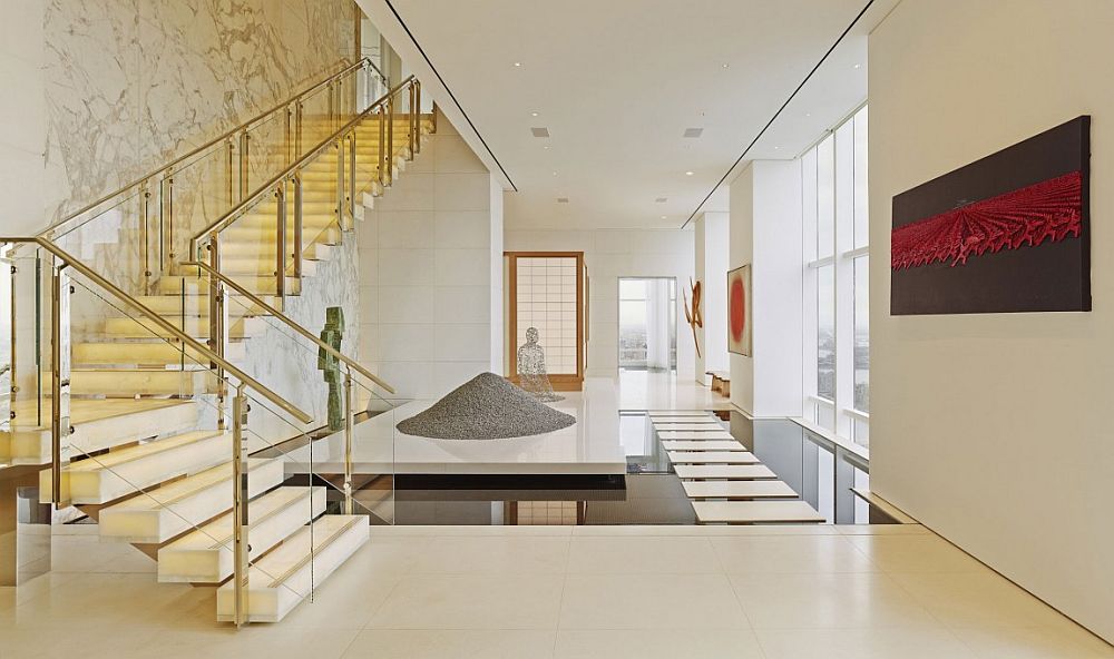 Spectacular entrance of NYC apartment with reflecting pond, stepping stones and waterfall