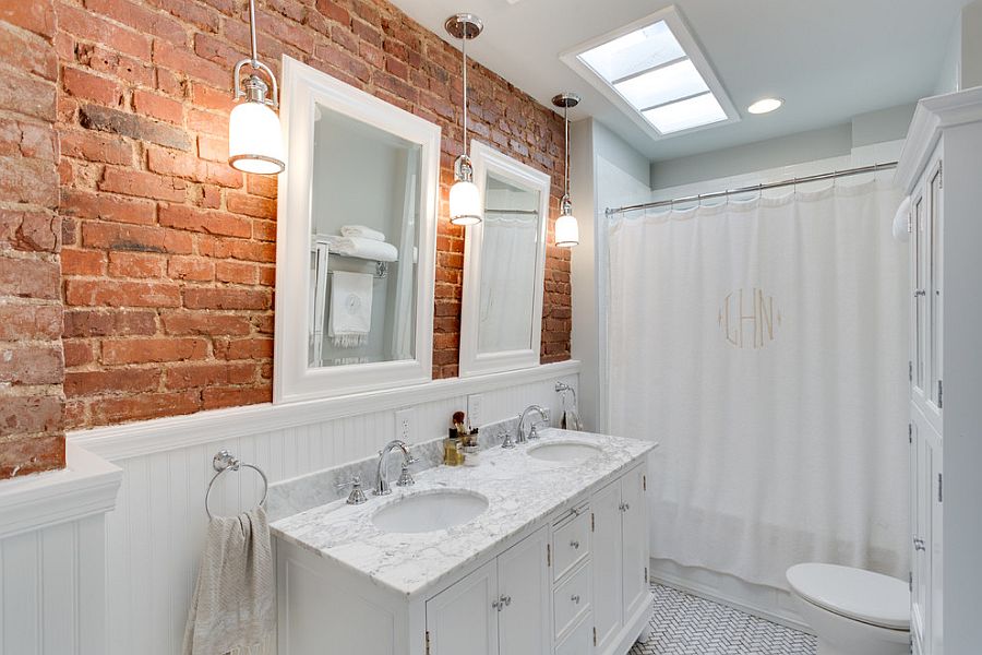 Traditional white bathroom with a brick backsplash [Design: The Ransom Company]