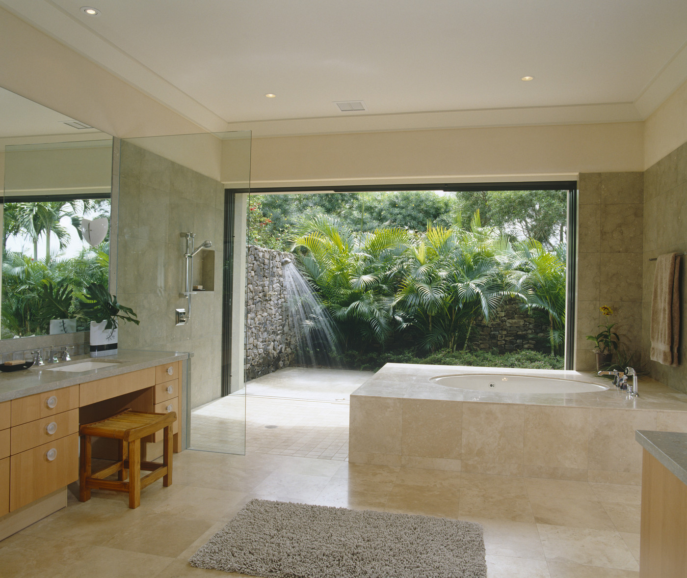 Tropical bathroom with vanity seating