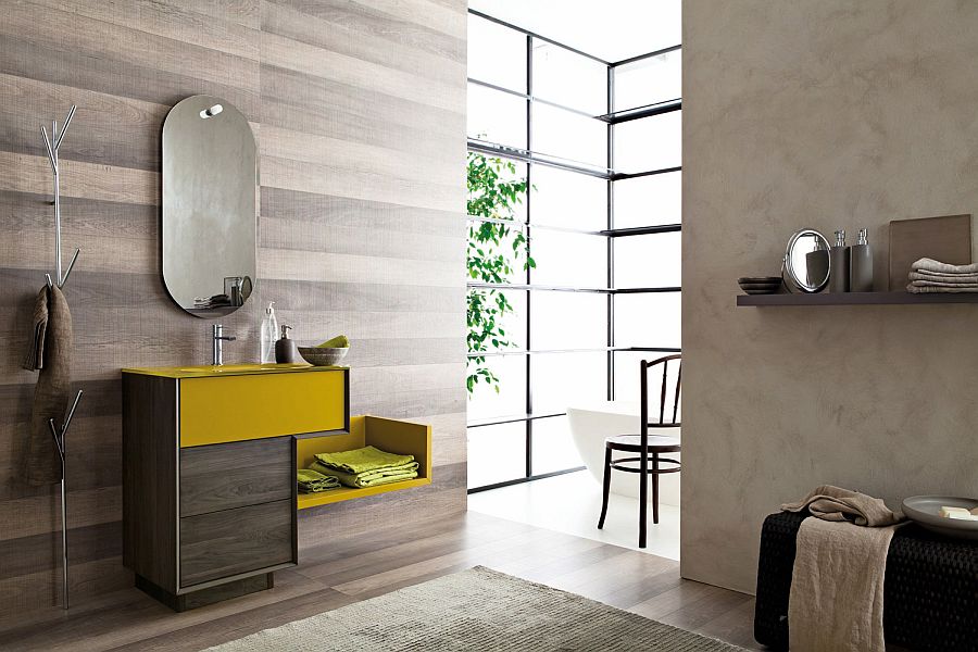 Vanity adds a hint of bright yellow to the bathroom in gray