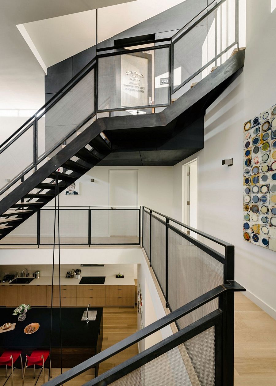 View of the lower level kitchen from the stairway