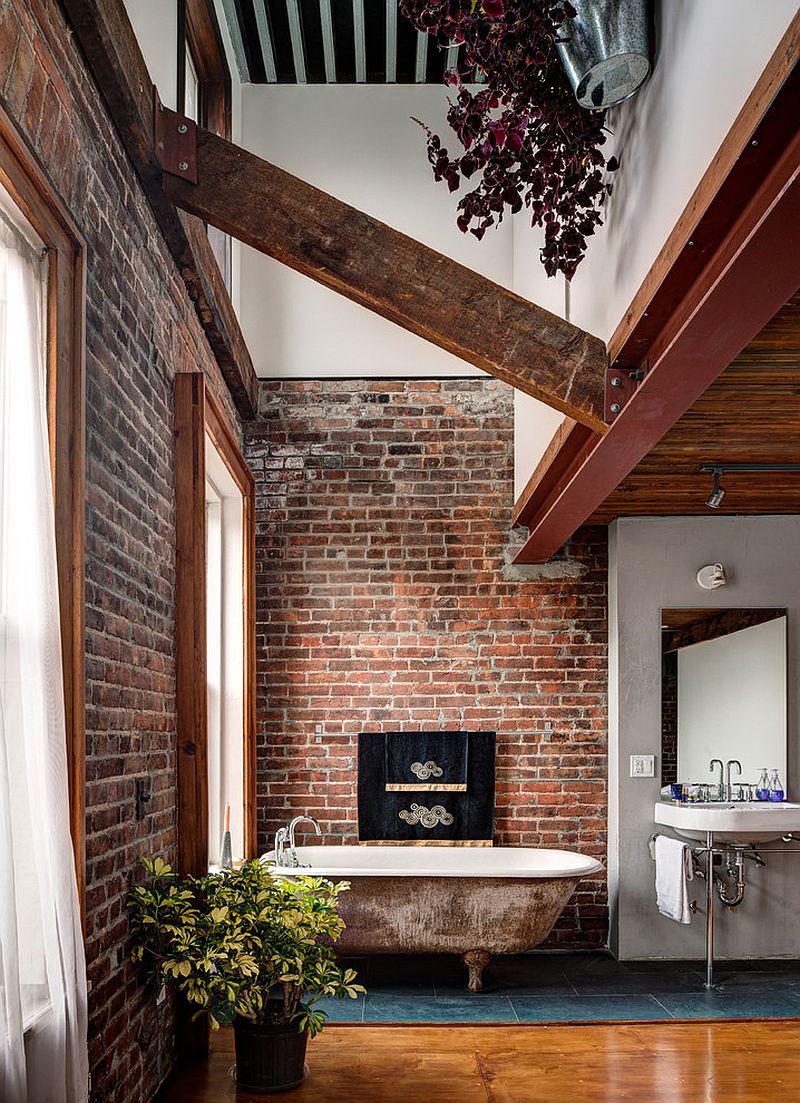 Vintage and reclaimed elements add weathered elegance to the industrial interior