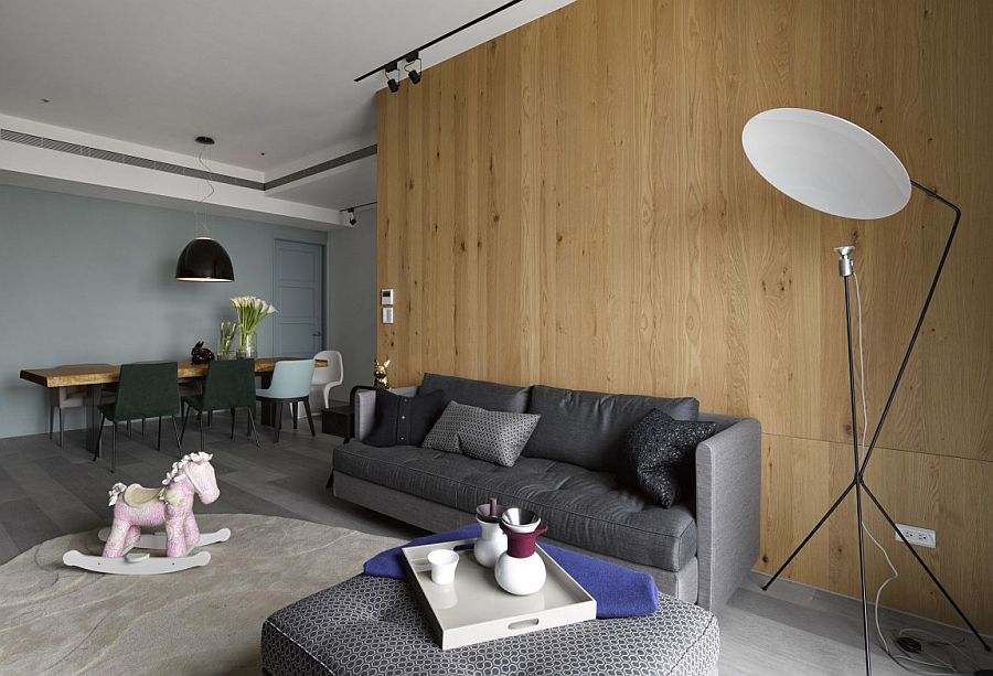 Wooden wall adds textural elegance to the small interior