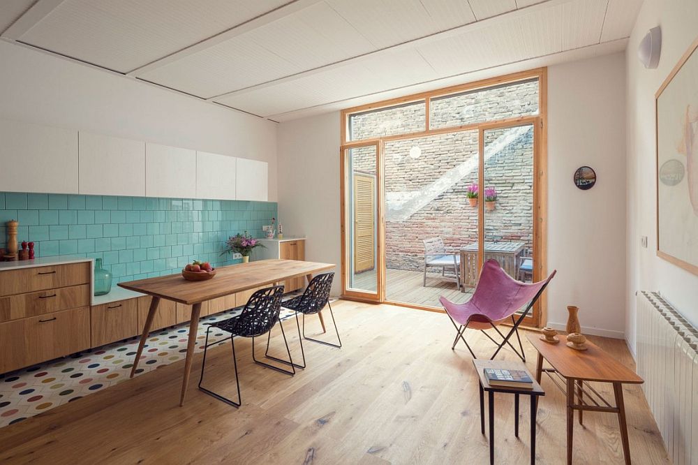 Back patio and entrance brings a flood of natural light into the living room