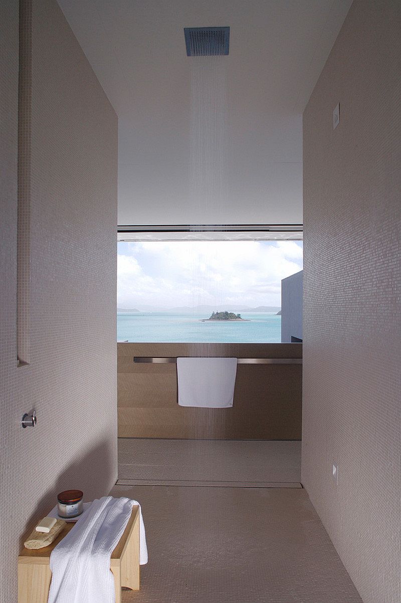 Bathroom with rainfall shower and ocean views