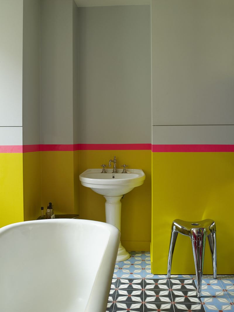 Bold color in a modern eclectic bathroom