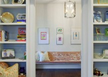 Bookshelf-lined-room-with-a-gallery-wall-view-217x155