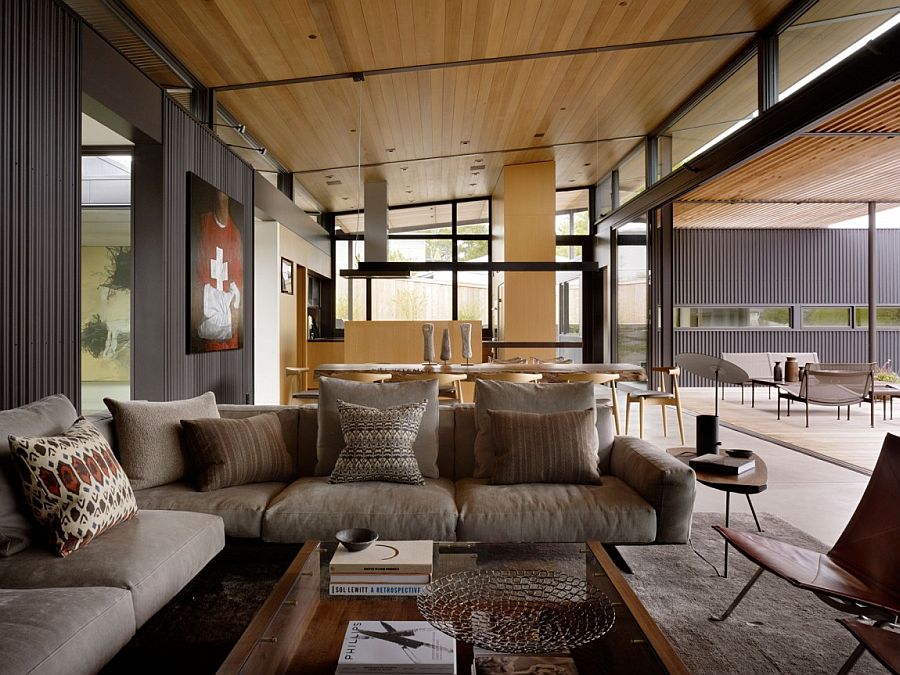 Breezy living room of Courtyard Residence with industrial style