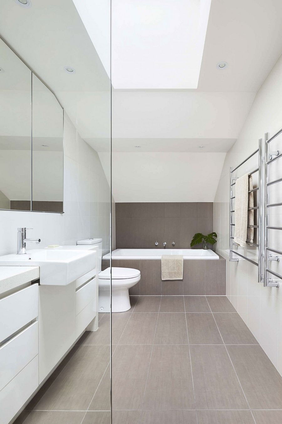 Bright and breezy contemporary bathroom with skylight