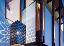 Brilliant-lighting-fixture-adds-hexagonal-pattern-to-the-walls-around-it-217x155