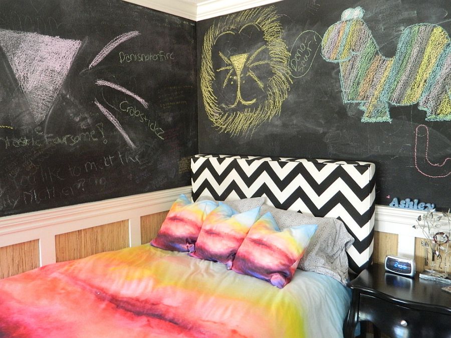 Chevron striped headboard holds its own in the eclectic bedroom with chalkboard walls [Design: Susan Thiel Design]