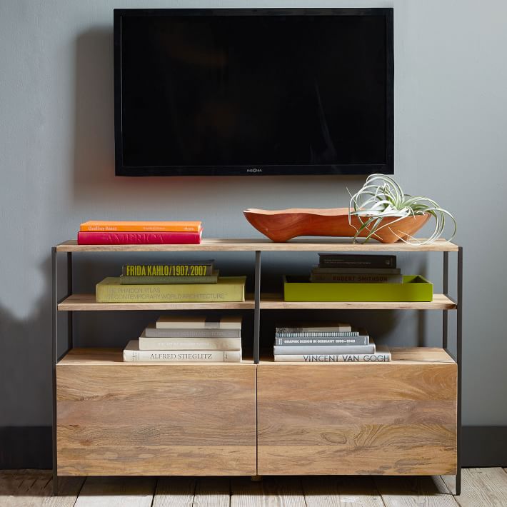 Color-coded books on a media console